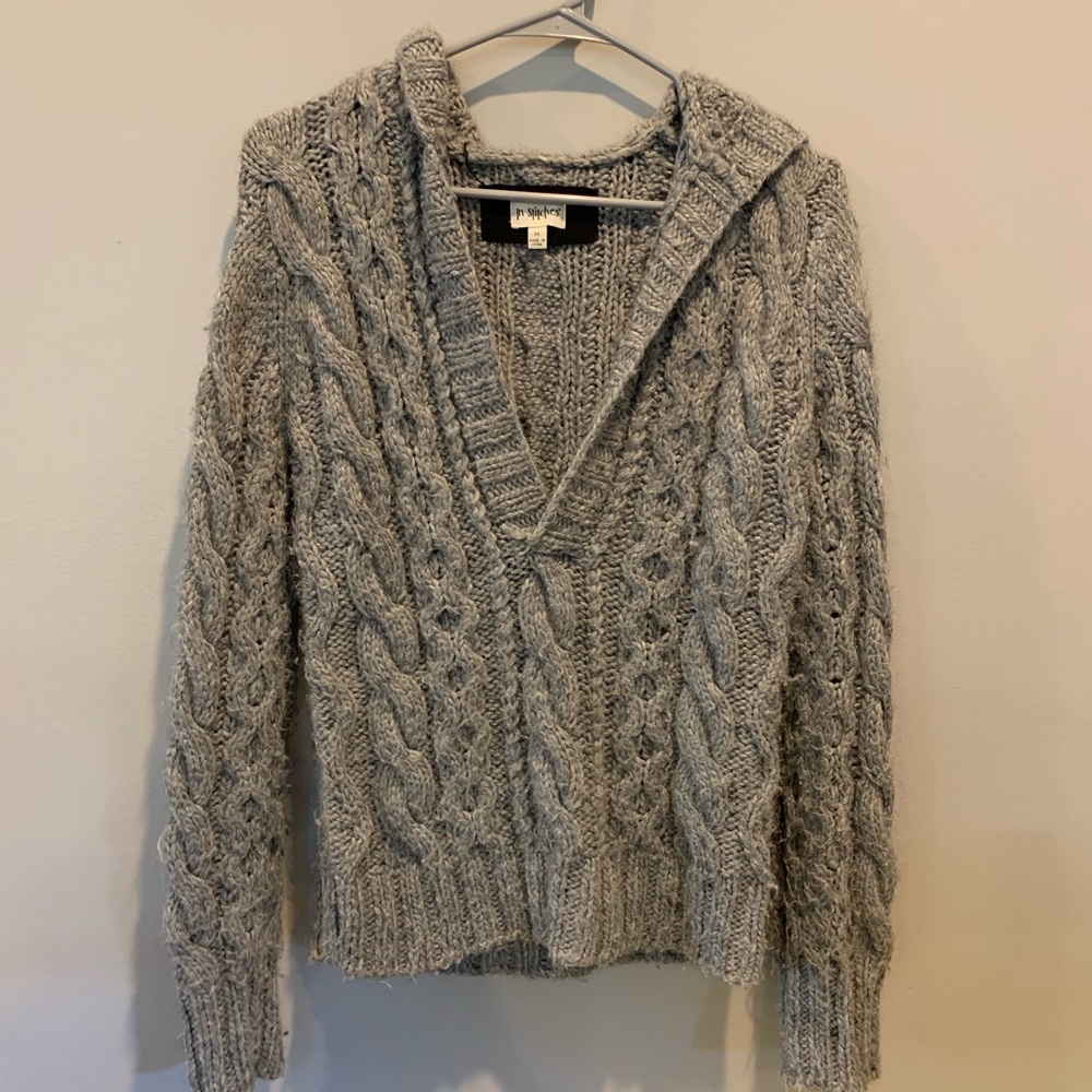 In Stitches woman’s sweater, EUC, size M